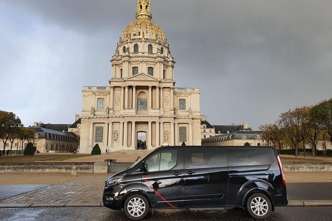 The gilded dome of Les Invalides with a private tour vehicle waiting below
