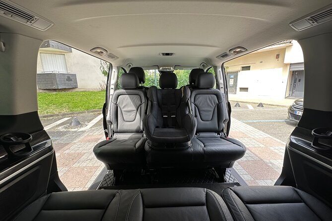 The rear seats of an air-conditioned private tour minivan