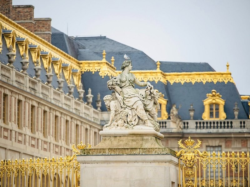 The gilded gate of the Palace of Versailles
